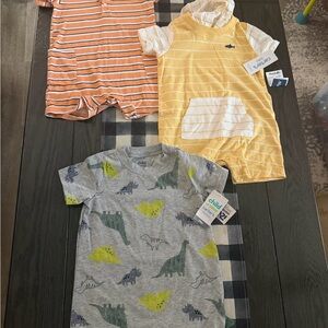 Lot of 3 boys 24 month rompers Carters new with tags.
